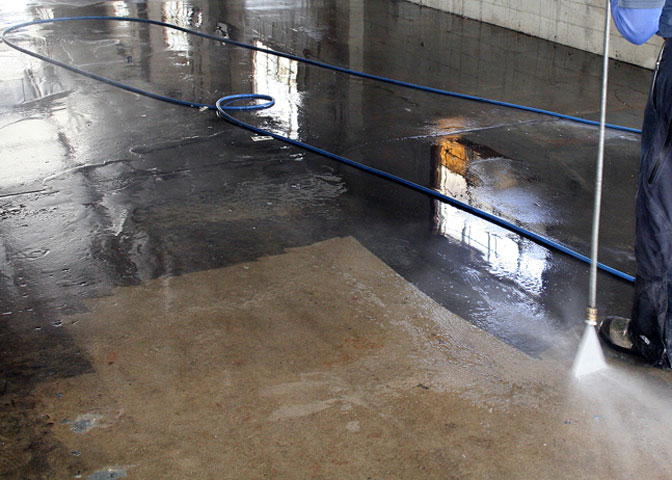 steam cleaning of a warehouse floor removing grease